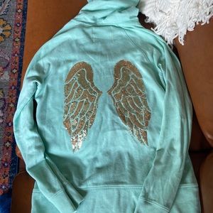 Victoria’s Secret zip up with hood.